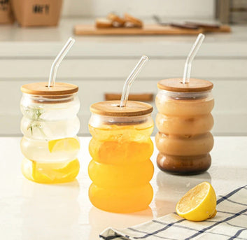 Wavy glass with bamboo lid and straw